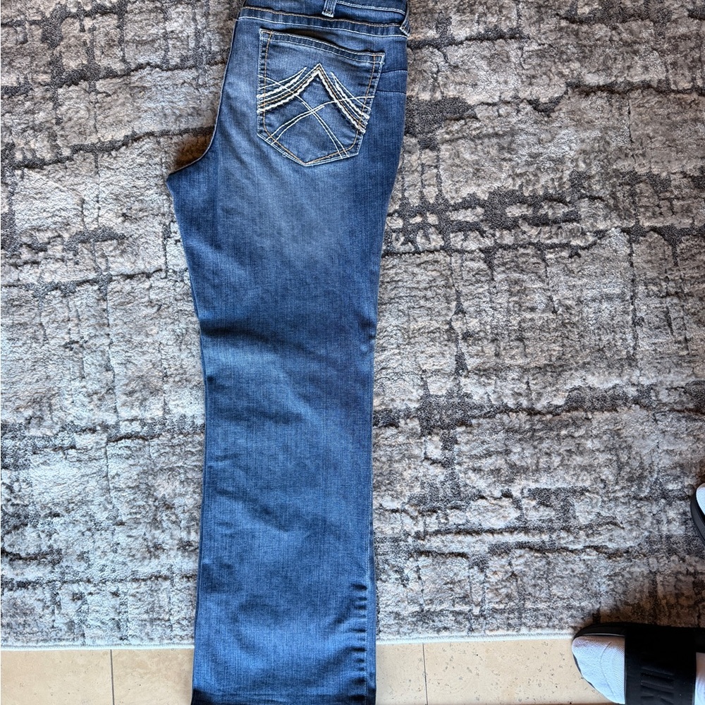 NEVER WORN!!! Brand new, Ariat Women’s Boot Cut Jeans, size 34R.